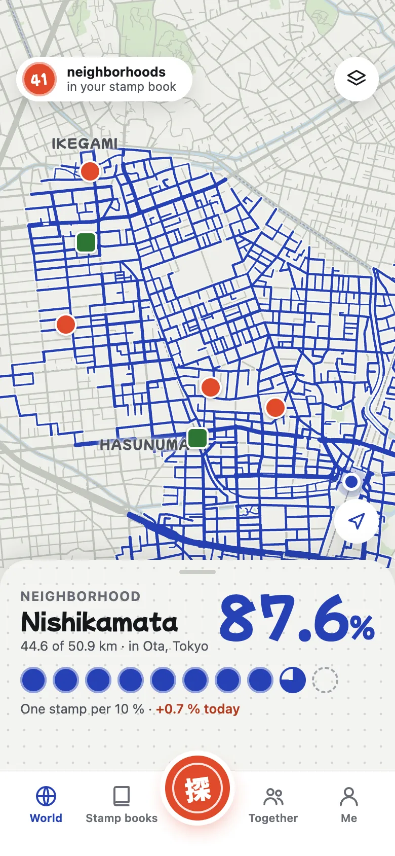 The World screen: the map around Kamata with the explored roads in blue.